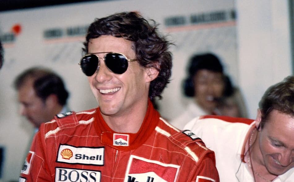 Amigo de Galvão Bueno, Ayrton Senna comemora pole position no GP da Austrália na F1 1991 (Foto: Toshifumi KITAMURA / AFP)