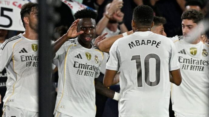 Jogadores do Real Madrid comemorando o gol do Real Madrid