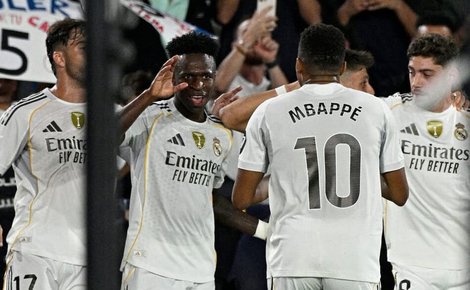 Jogadores do Real Madrid comemorando o gol do Real Madrid