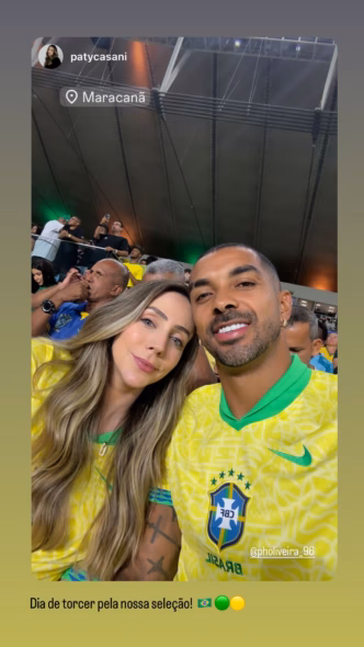Paulo Henrique, do Vasco, e sua esposa Patrícia no Maracanã assistindo ao jogo da Seleção Brasileira.