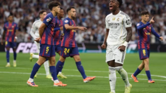 Vini Jr em ação durante o clássico entre Real Madrid e Barcelona.