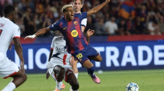 Lamine Yamal em ação pelo Barcelona contra o PSG na Champions League.