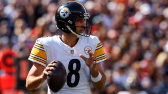 Aaron Rodgers em ação antes de enfrentar o Green Bay Packers.