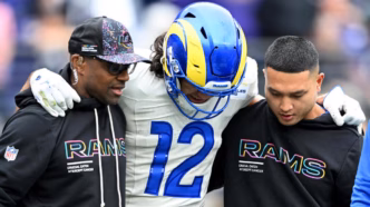 Puka Nacua em ação durante uma partida dos Los Angeles Rams na NFL.