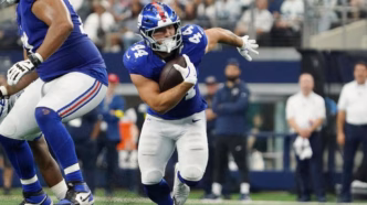 Cam Skattebo, running back do New York Giants, em ação.