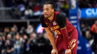Darius Garland com a bola pelo Cleveland Cavaliers.