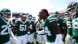 Jogadores do New York Jets em campo.