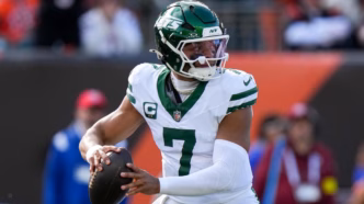Jogadores do New York Jets comemorando vitória.