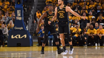 Jimmy Butler e Stephen Curry em quadra pela NBA
