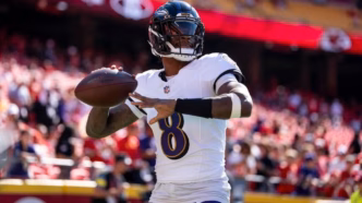 Lamar Jackson em ação pelo Baltimore Ravens. O quarterback é peça fundamental para o ataque dos Ravens.