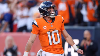 Bo Nix em ação durante a partida entre Broncos e Giants.