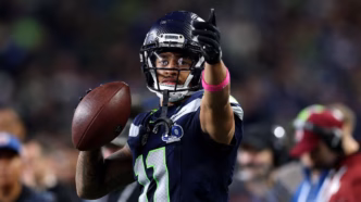 Jogadores do Seattle Seahawks celebram vitória contra o Houston Texans.